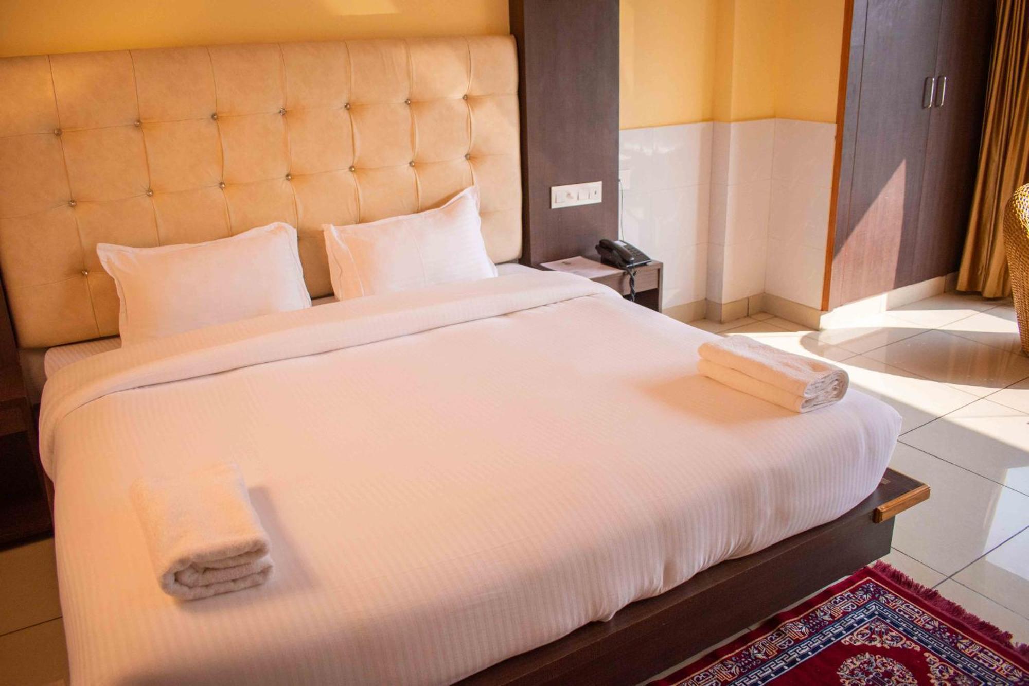 Mvt Guesthouse & Restaurant Rishīkesh Rum bild